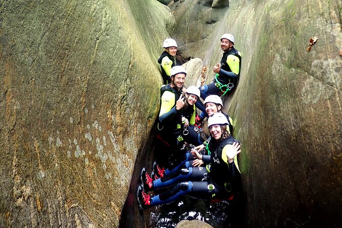 Basic Corippo Canyoning Experience in Valle Verzasca - The final slide into Lake Vogorno