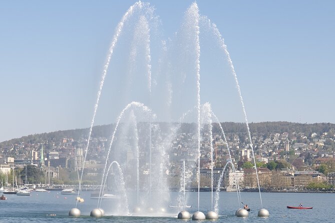 Lake Zurich boat tour for an afternoon ! - Grossmünster and Fraumünster from the river
