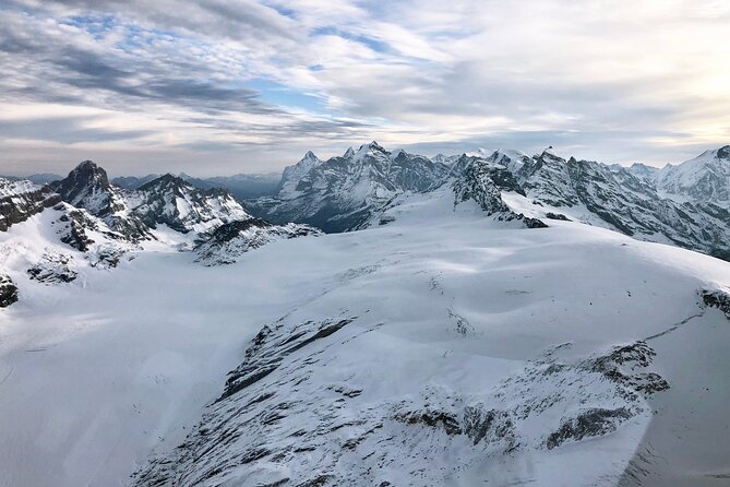 Matterhorn helicopter tour - longest scenic flight from Bern over the Swiss Alps - Glaciers, ice walls, and a changing Alpine view