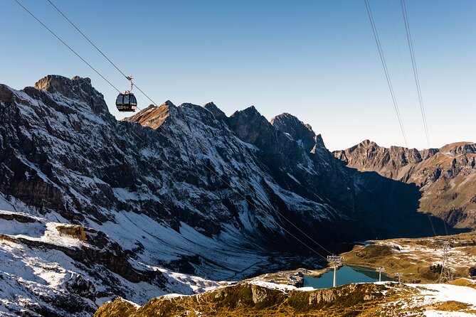 Mt Titlis Cable Car from Engelberg with Ice Flyer - The Ice Flyer over snowfields and crevasses