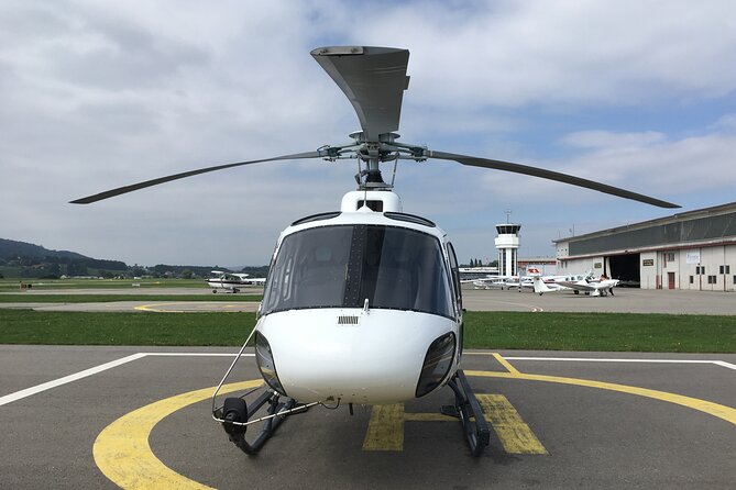Private helicopter flight to Stockhorn mountain, with view to the Swiss Alps - Lake Thun and the blue-water view