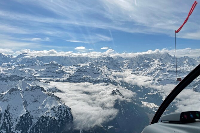 Private helicopter tour to the Swiss Alps - see the Eiger, Monch and Jungfrau - The Sphinx at Jungfraujoch, a high point of the flight