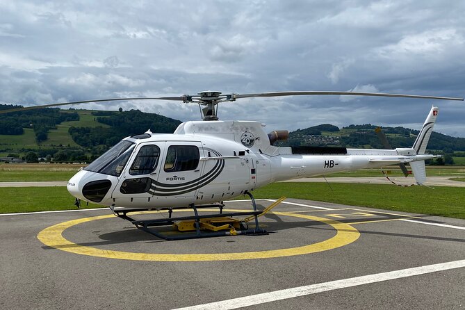 Private helicopter tour to the Swiss Alps - see the Eiger, Monch and Jungfrau - Interlaken between two blue lakes