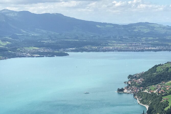 Private Sightseeing Boat Trip on Lake Thun, Interlaken - Sunset, mountains, and pizza aboard