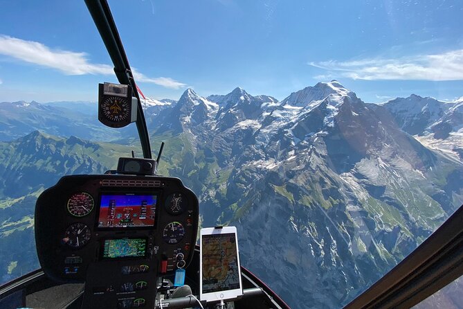 Private Swiss Alps helicopter tour over snow covered mountain peaks and glaciers - Interlaken between Lake Thun and Lake Brienz